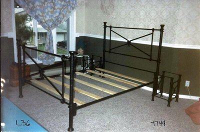Wrought iron bed frame with cross design