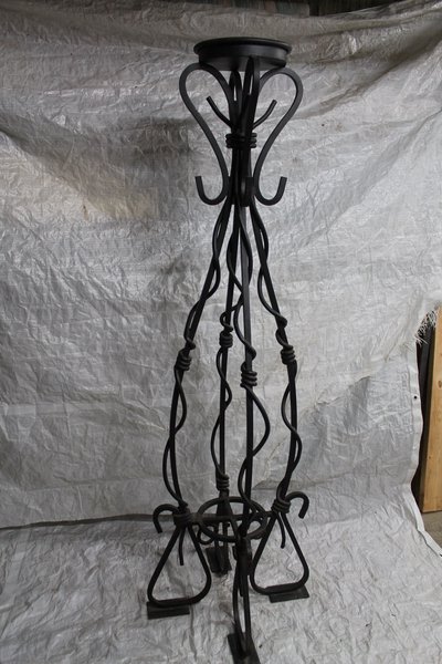 Floor-standing wrought iron candelabra with decorative knots