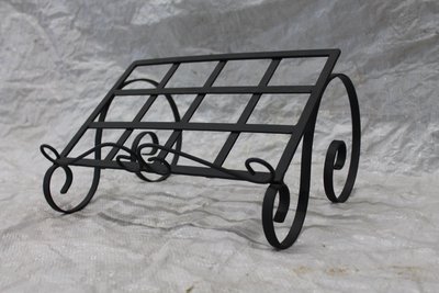 Wrought iron cookbook stand with scrollwork