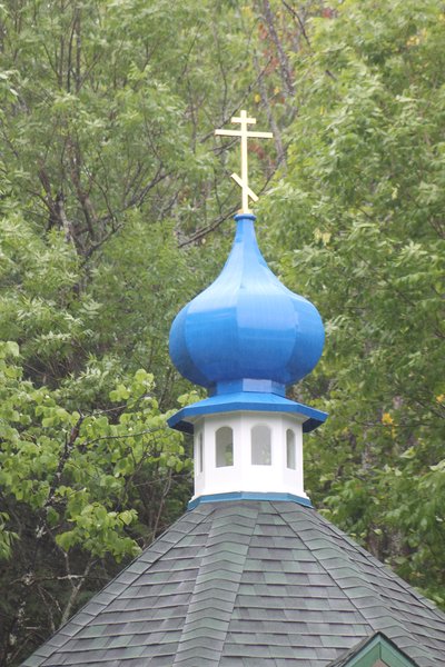 Wrought iron Orthodox cross on church dome
