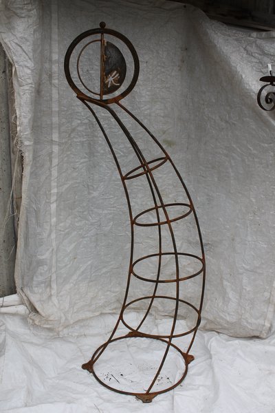 Abstract wrought iron sculpture with circles and spirals