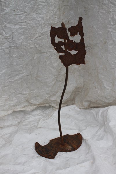Rustic wrought iron flower sculpture, alternate view