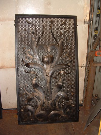 Wrought iron fireplace screen panel with acanthus motifs