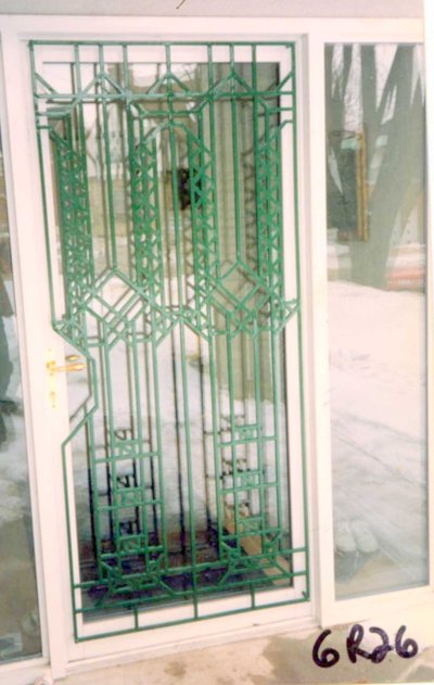 Green art deco wrought iron door grille