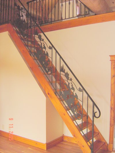 Mezzanine railing with cut leaf motif panel