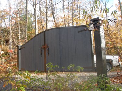 Spiral staircase railing with leaf motifs, alternate view